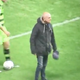 Illustration for article titled Angry Idiot Sneaks Onto Field To Berate His Teams Players